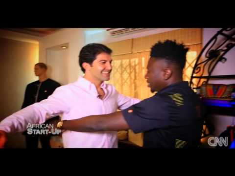 Amir Daftari checks out Chocolate Fashion by Ghana's Kwaku Bediako.