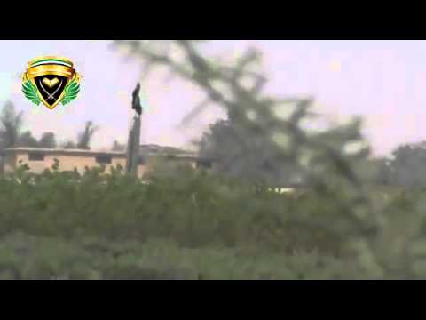 نصب راية التوحيد من قبل لواء بشائر النصر على أسوار مطار دير الزور العسكري