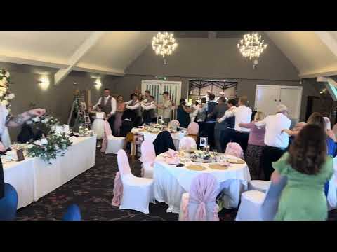 Singing Waiters Surprise Guests with ‘Marry You’ Conga Line!