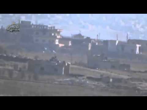 استهداف دبابة لقوات النظام بصاروخ تاو من قبل جيش النصر_ في حاجز الصوامع في محافظة حماة