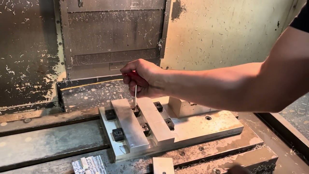 Putting parts into a machine fixture with inspection