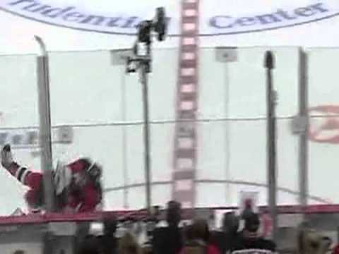 Dainius Zubrus hipchecks Mark Fistric