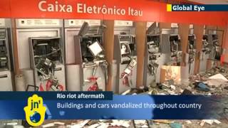 Brazilian cities littered with glass and debris following another night of anti-government rioting