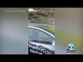 Tesla driver apparently asleep at the wheel on California freeway