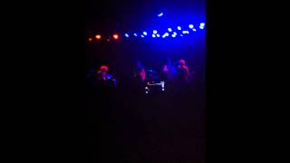 Poor quality footage of a Brazilian girls band concert