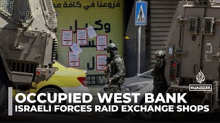 Israeli forces raid West Bank exchange shops, kill one Palestinian, wound 30 in Nablus assault
