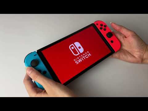 Консоль Nintendo Switch OLED Model HEG-001 64GB Blue Red Новий - фото 1 - id-p1495673231