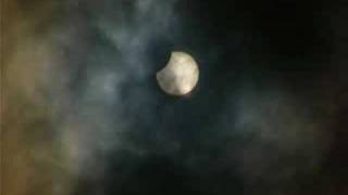 preview picture of video 'Partial solar eclipse with clouds'