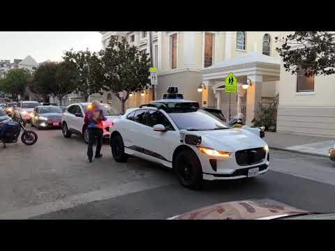 Driverless taxis navigate complex road to future - YouTube