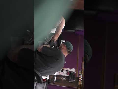 Here we have @stefan.catalin.druga working on a realism portrait his client at @vividinkmoseley 💜⚡️