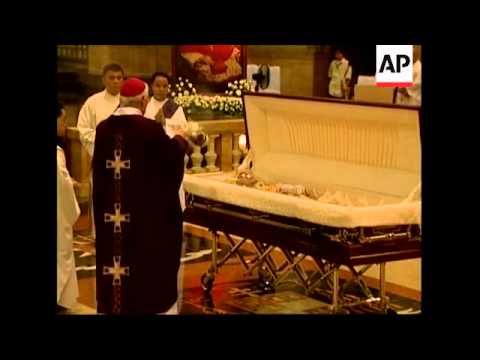 WRAP Cardinal Sin's coffin arriving at cathedral, mass, reax