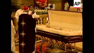 WRAP Cardinal Sin's coffin arriving at cathedral, mass, reax