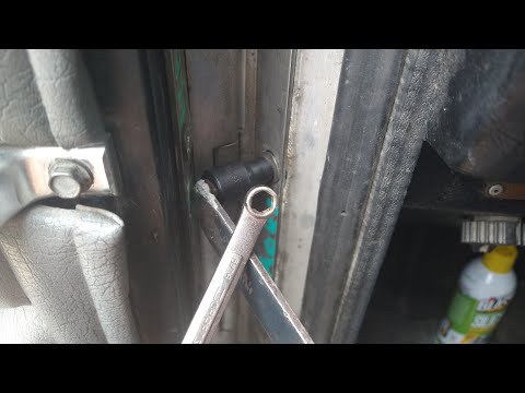DIY 2 Adjust driver door hinge on 2000 Peterbilt 379. Modify tool to fit.
