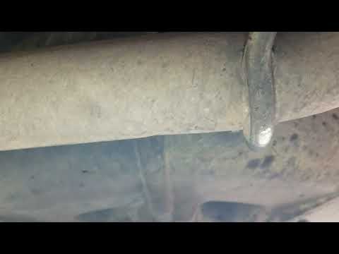 2008 Grand Caravan catalytic converter exhaust pipe flex mesh transition gone.