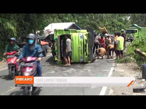 Dump Truck Terbalik di Desa Lubuk Sini