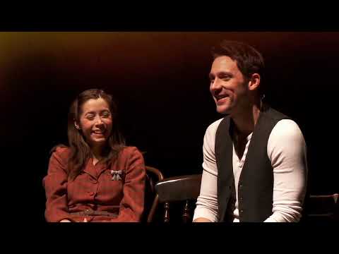 Once musical promotional artwork with guitars and warm pub lighting