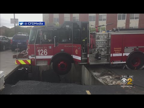 Crane Arrives To Help Remove Chicago Fire Engine From Collapsed Parking Garage