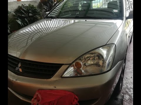 Where to adjust your headlights beam Mitsubishi Lancer 04-05