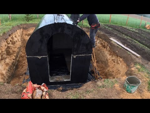 Montaż piwniczki ogrodowej na studni, piwnica ogrodowa ziemianka