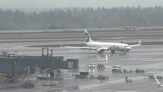 Listen: 911 audio of man stuck in plane cargo hold
