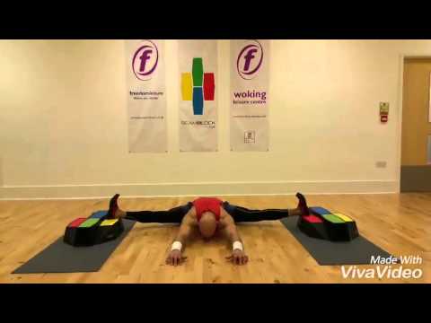 Straddle split on the beamblock