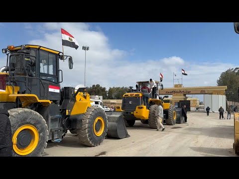 Bulldozers, construction equipment at Rafah crossing waiting to enter Gaza | AFP