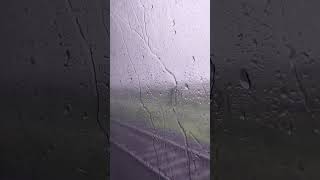 Rain' drops at train's window glass