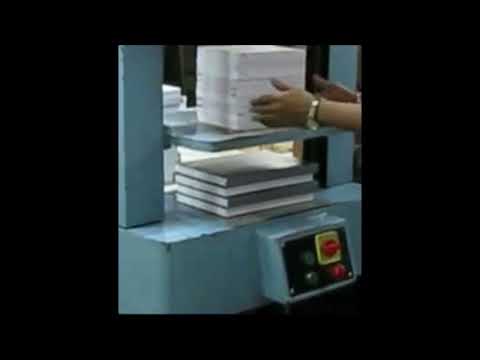 Automatic book press machine