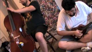 Travis Johnson and Kris Gruda at Apartment Music #9 - cello + guitar, ukulele - improvisation