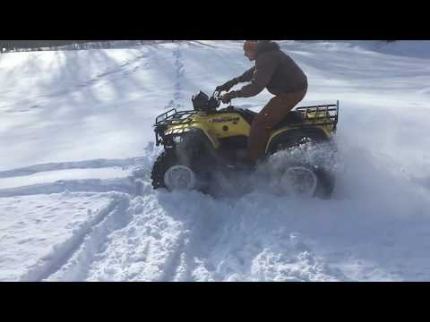 Foreman 450 Kenda Bear Claw HTR in the snow