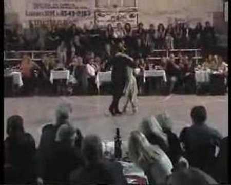  Oscar Martinez Pey  and  Gabriela Amalfitani  are  dancing  to  the  milonga  "  No Hay Tierra Como La Mia  "