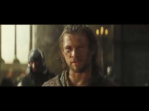 Trailer frame: surf charge at the dark fortress, choir surging underneath
