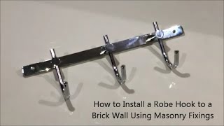 How to Install a Robe Hook to a Brick Wall Using Masonry Fixings