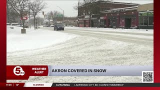 Akron drivers take it slow and steady on snow packed roads