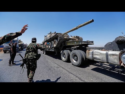 Dozens killed in sectarian violence and airstrike in southern Syria