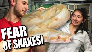 GETTING OVER HER FEAR OF SNAKES BY FEEDING A GIANT PYTHON!! Brian Barczyk by Brian Barczyk