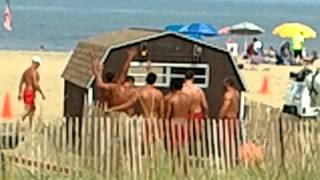 preview picture of video 'Rehoboth Beach Lifeguards Do Pull-Ups - August 2012'