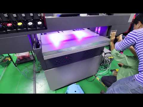 90x60cm DIGITAL UV flatbed printer machine testing in factory