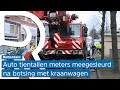 Kraanwagen ramt auto: twee gewonden