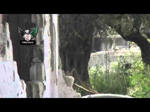 اشتباكات بين عناصر لواء مجاهدي الغوطة وقوات النظام على المتحلق الجنوبي في عربين