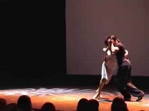  Gaston Torelli  and  Mariela Sametband  are  dancing  to  a  tango