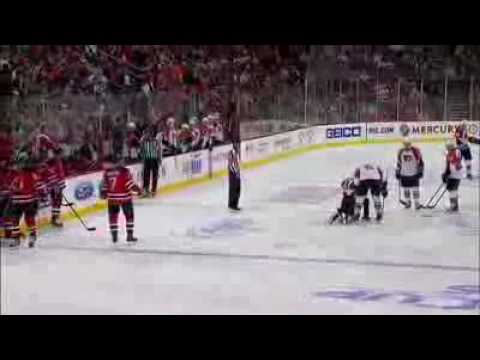 Ian Laperriere Blocks a Shot With His Face (April,22, 2010)