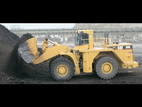 Caterpillar 990 Wheel Loader Loading Trucks With Two Passes