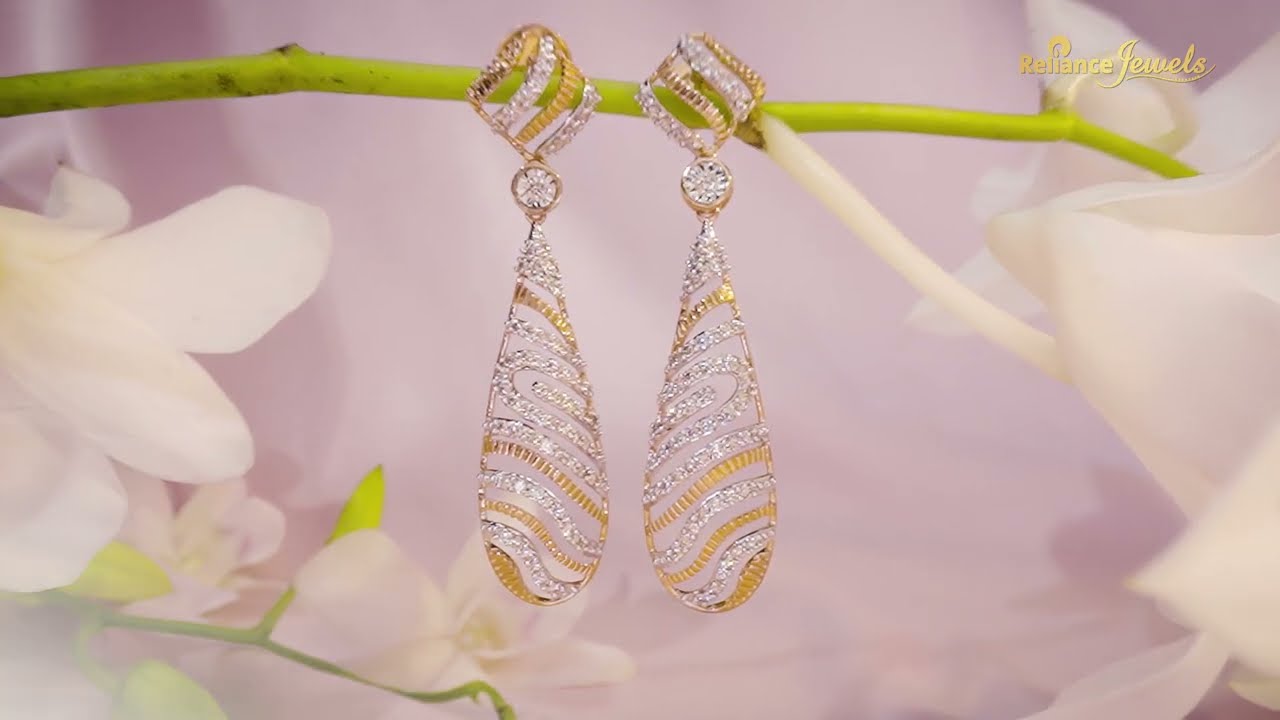 EARRINGCOLLECTION Admiration, guaranteed. Reliance Jewels Be The Moment.  www.reliancejewels.com #reliance #reli… | Earrings collection, Jewelry,  Jewelry design