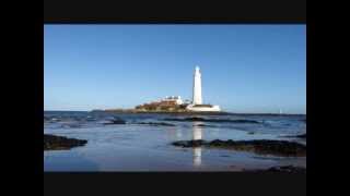 preview picture of video 'St Mary's Lighthouse & Island,  Whitley Bay, High Tide, the Jogger the Cyclist and the Car'