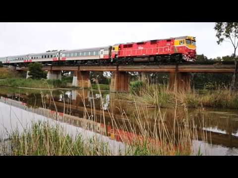 V/Line N loco & passenger train over the Barwon River.