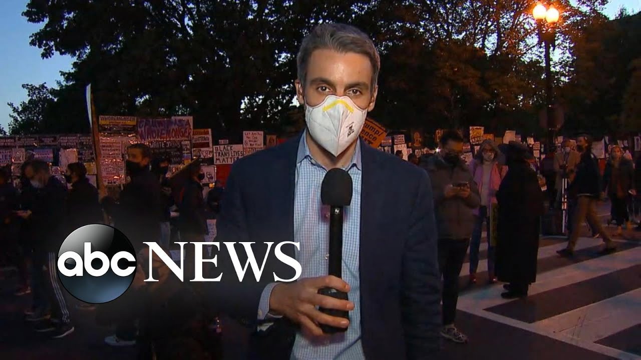 Crowds gather outside Black Lives Matter Plaza in DC as Election Day closes