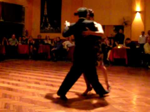  Samantha Dispari  and  Cristhian Sosa  are  dancing  to  a  tango