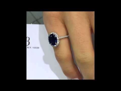 3 ct Blue Oval Sapphire in Diamond Halo Engagement Ring