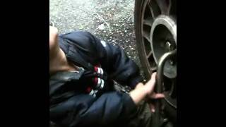 Jacob changes a tire